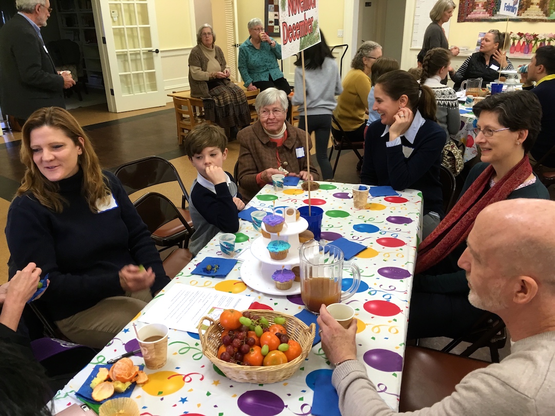 Gathering around a table at the church
